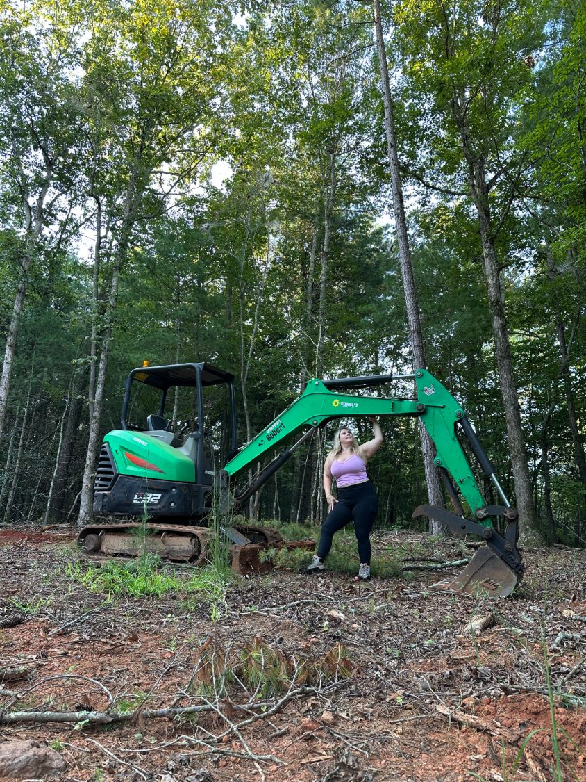 Bree clearing land on the property