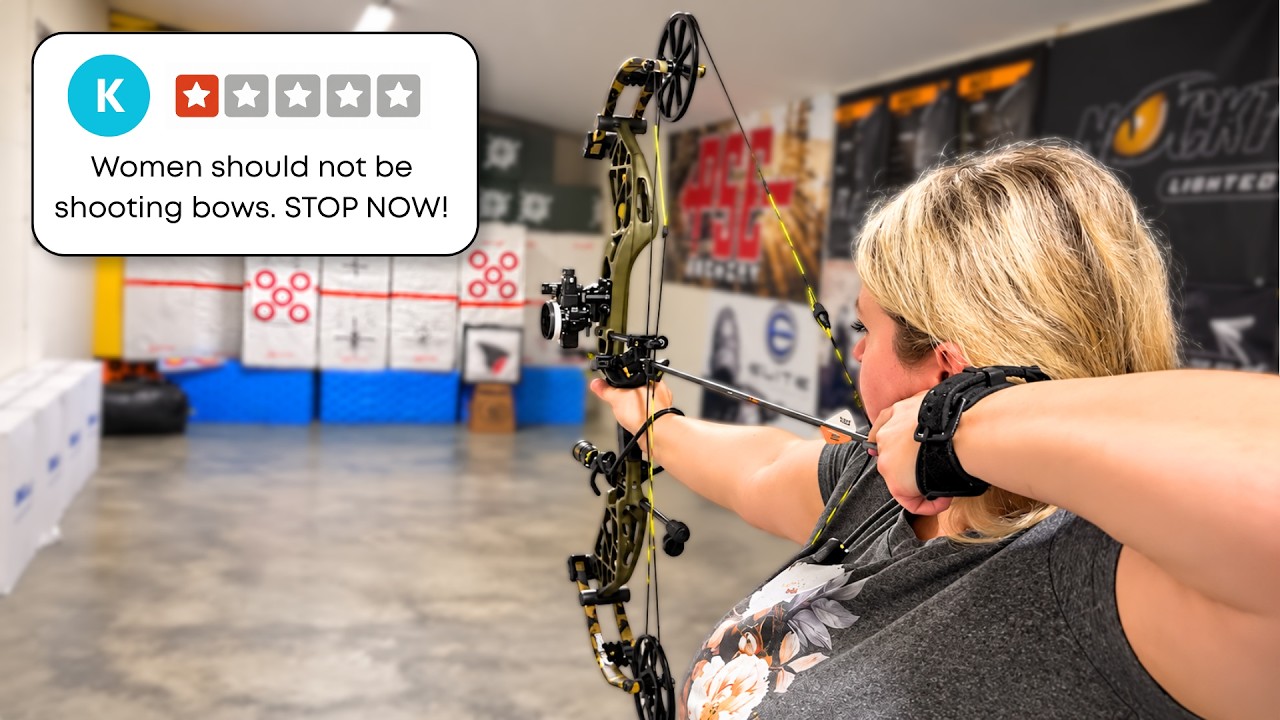 Bree aiming a compound bow at an indoor range